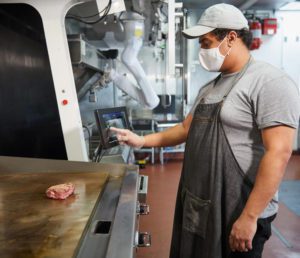 Miso Robotics Teammember using CookRight Grill
